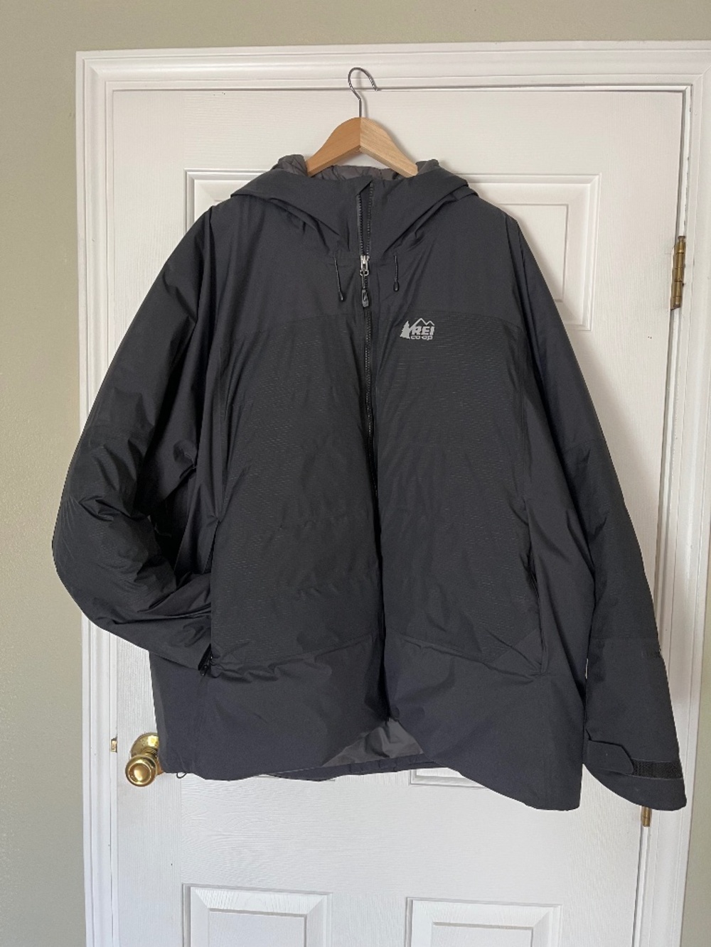 REI men puffy waterproof jacket